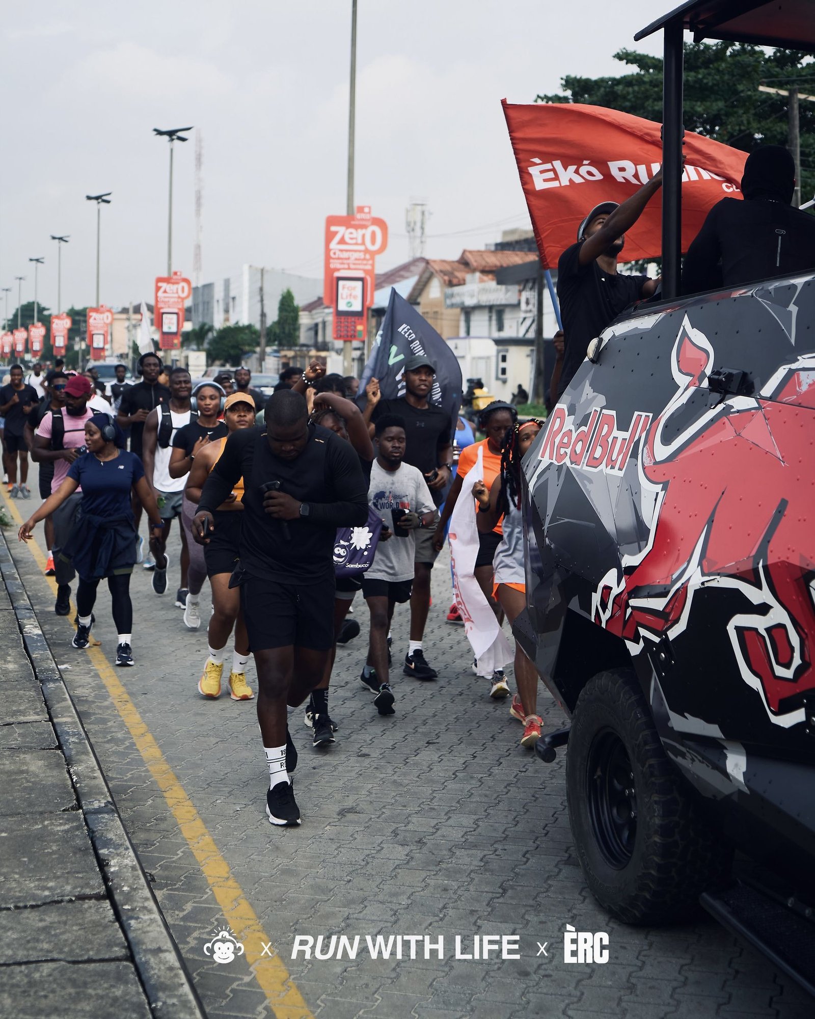Life Runners running together through Lekki with a Red Bull support truck